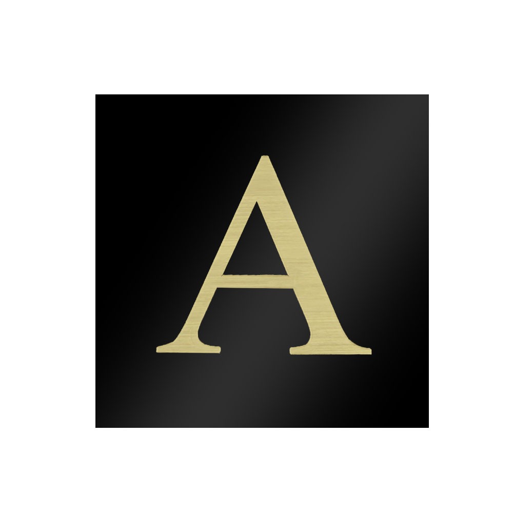 Letter A engraved on gloss black brass sheet