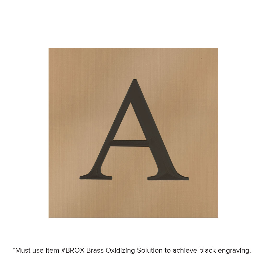 Letter A engraved and oxidized on bright gold brass sheet