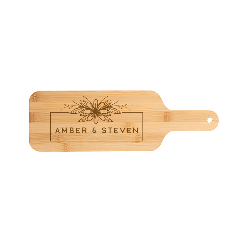 Paddle serving board that says "Amber & Steven"
