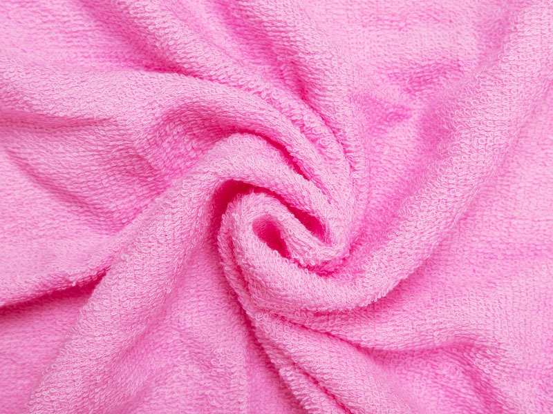 Pink Hooded Baby Towel bunched up to show fabric