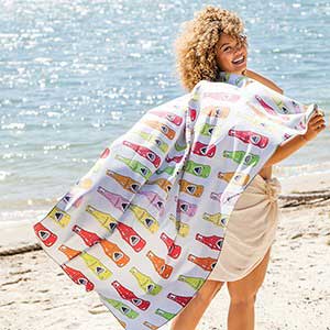 Girl with quick dry towel at the beach