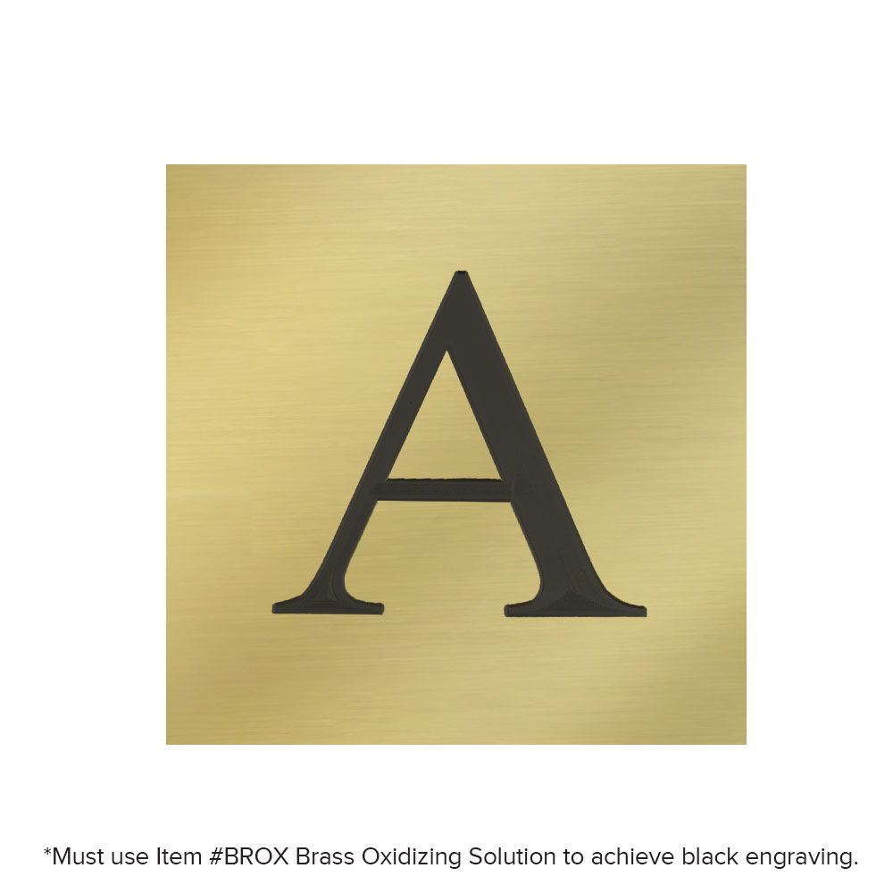 Letter A engraved on bright gold brass sheet and oxidized