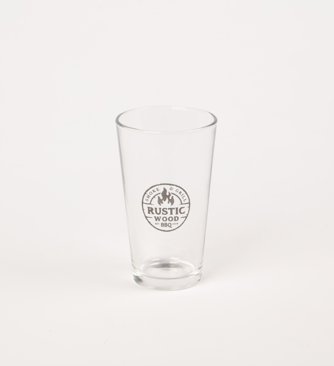 drinking glass with Rustic Wood BBQ logo