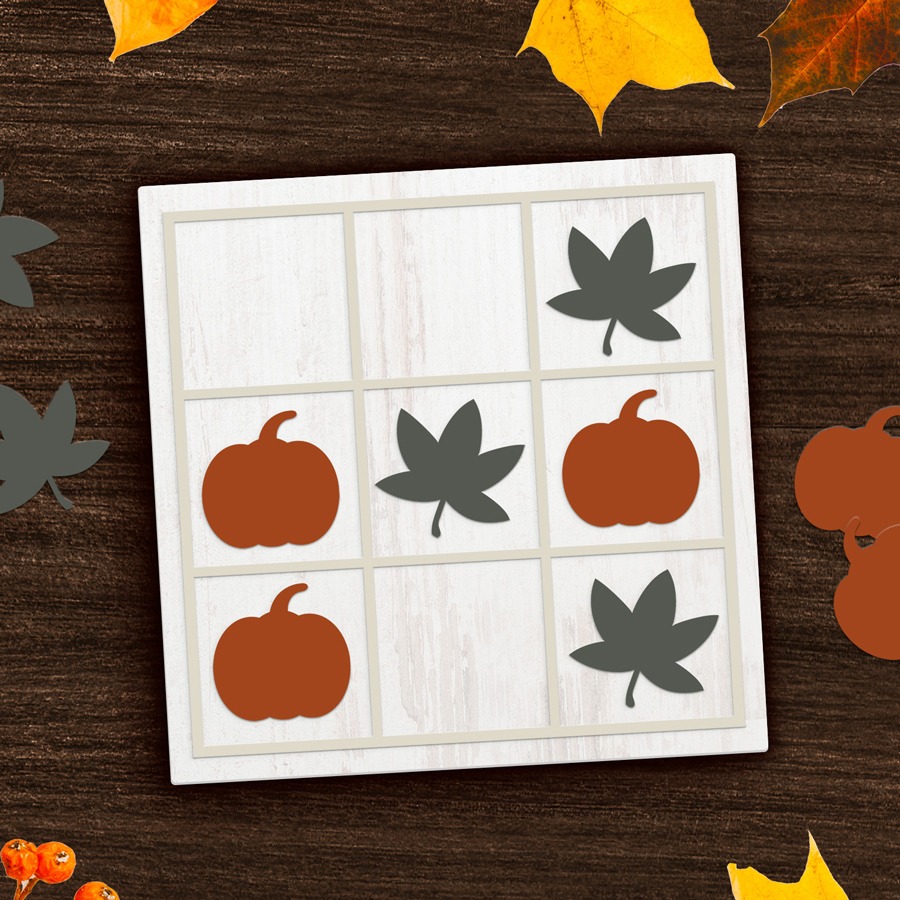 Fall Tick-Tack-Toe board with pumpkins and leaves