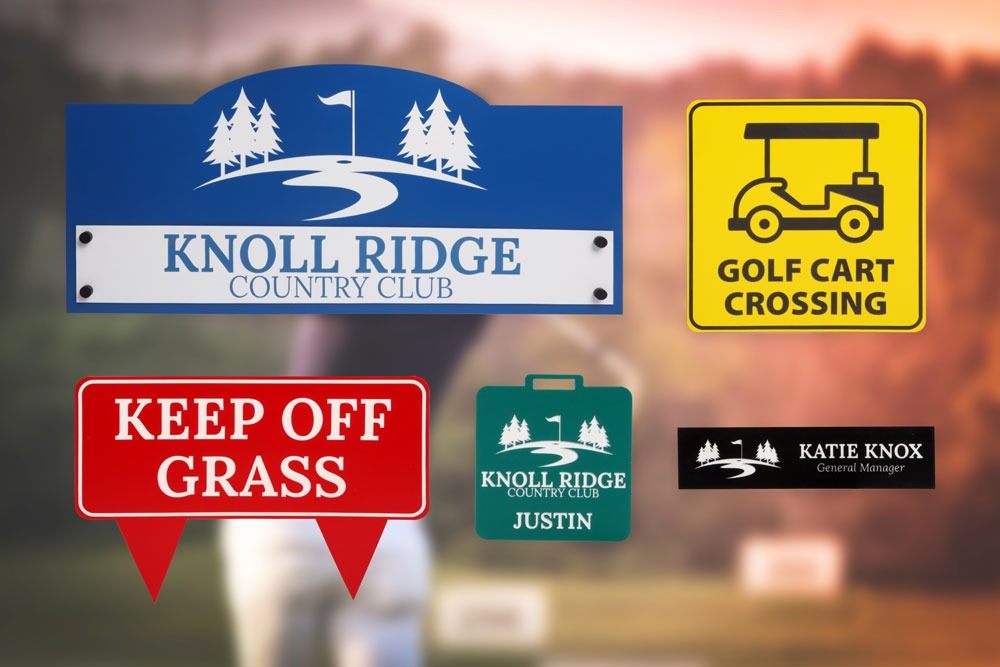 variety of golf course signs and name badges