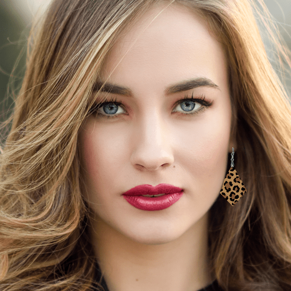 woman wearing Hardboard diamond shaped earing with cheetah print