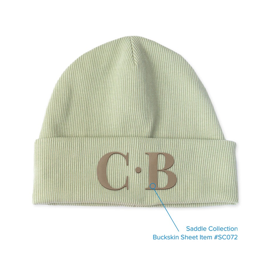 light green hat with initials on it using the saddle collection buckskin sheet
