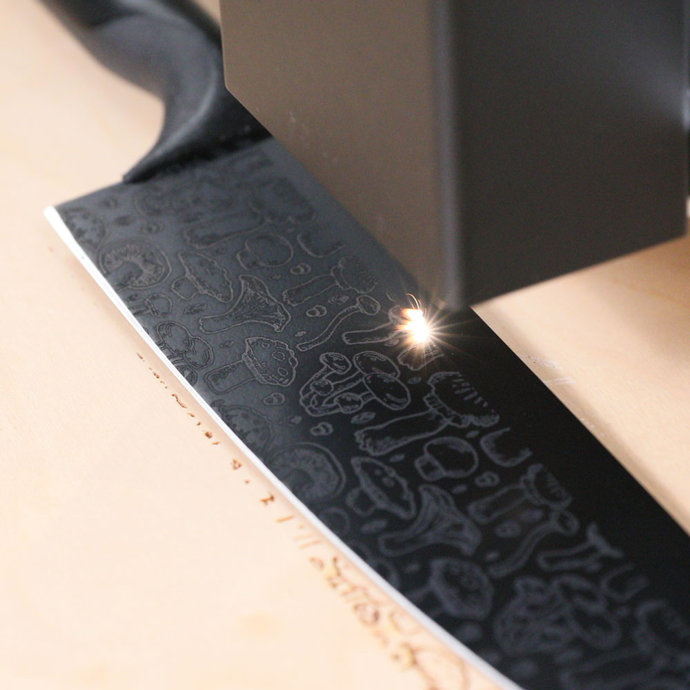 Laser engraving knife blade