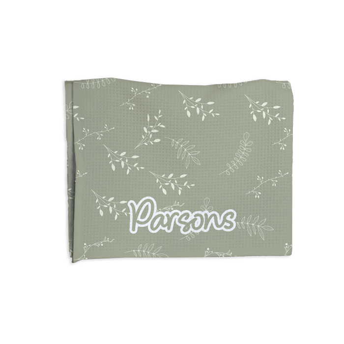 folded towel with Parsons print
