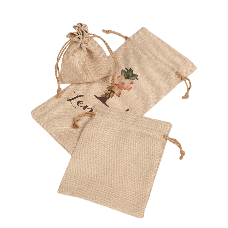 3 different size faux burlap drawstring bags 1 of them is pulled shut