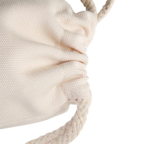 opening of the tan CANVAS DRAWSTRING BAG sinched up 
