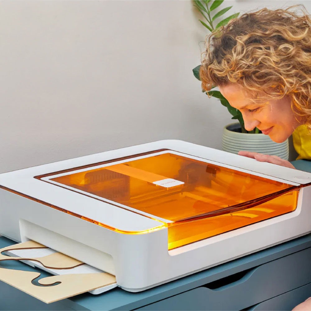 Glowforge Aura diode laser with person