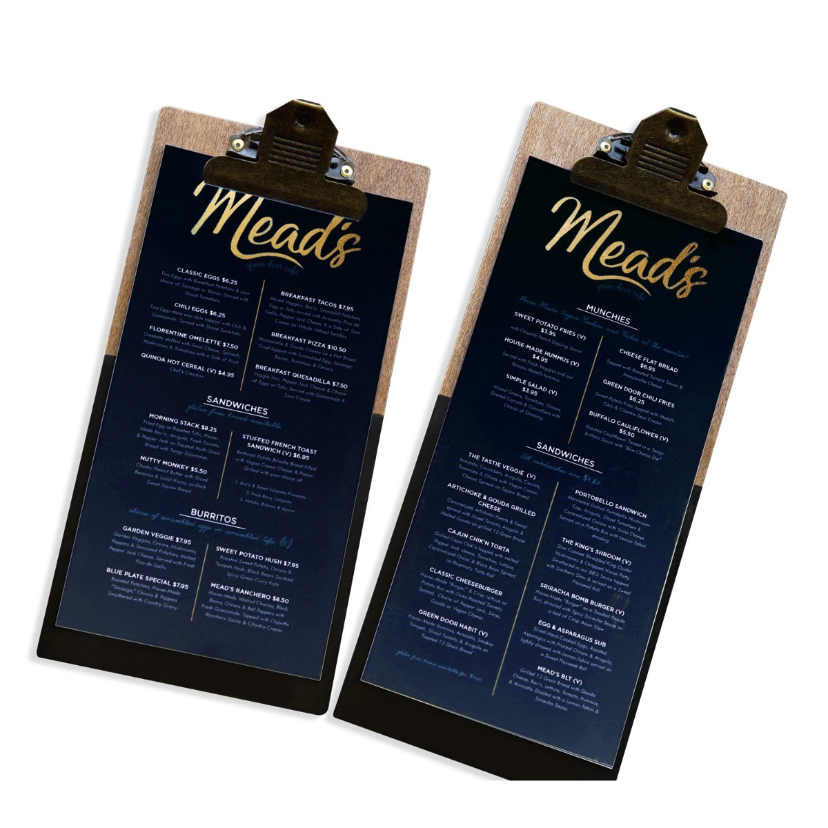 2 black an gold menus on clipboards