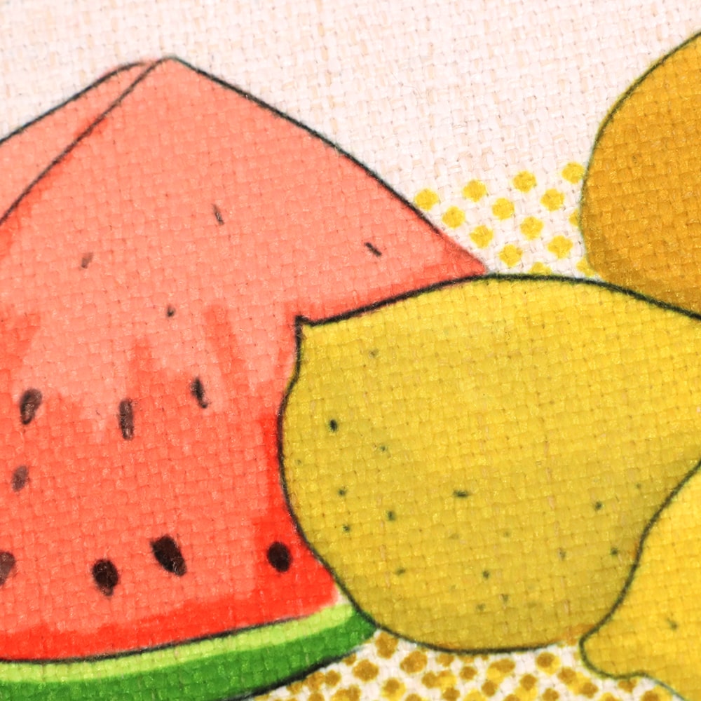 Close up of fruit design on linen placemat