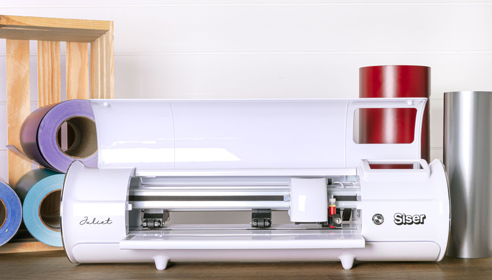 Siser Juliet vinyl cutter with rolls of vinyl