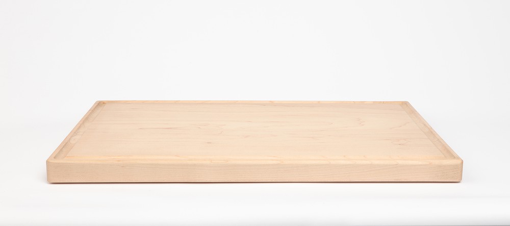 Blank maple cutting board with juice groove laying down