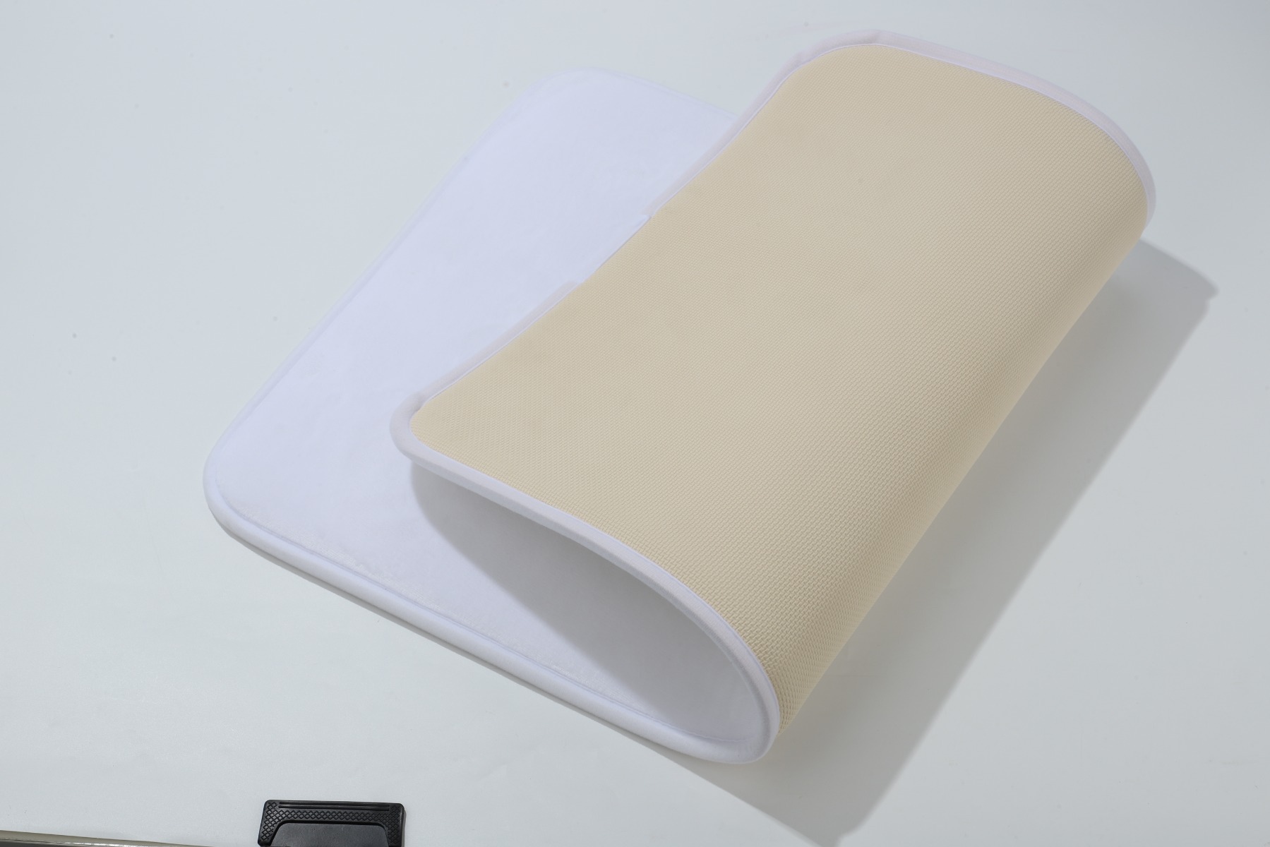 Underside of plush floor mat