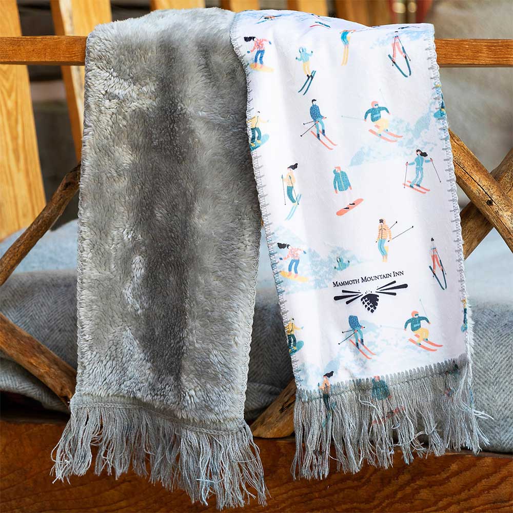 scarf with ski design draped on chair
