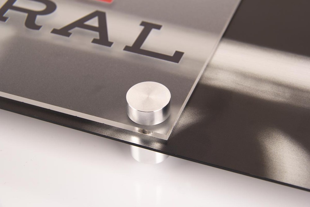 closeup of the standoffs on the Baseball sign 