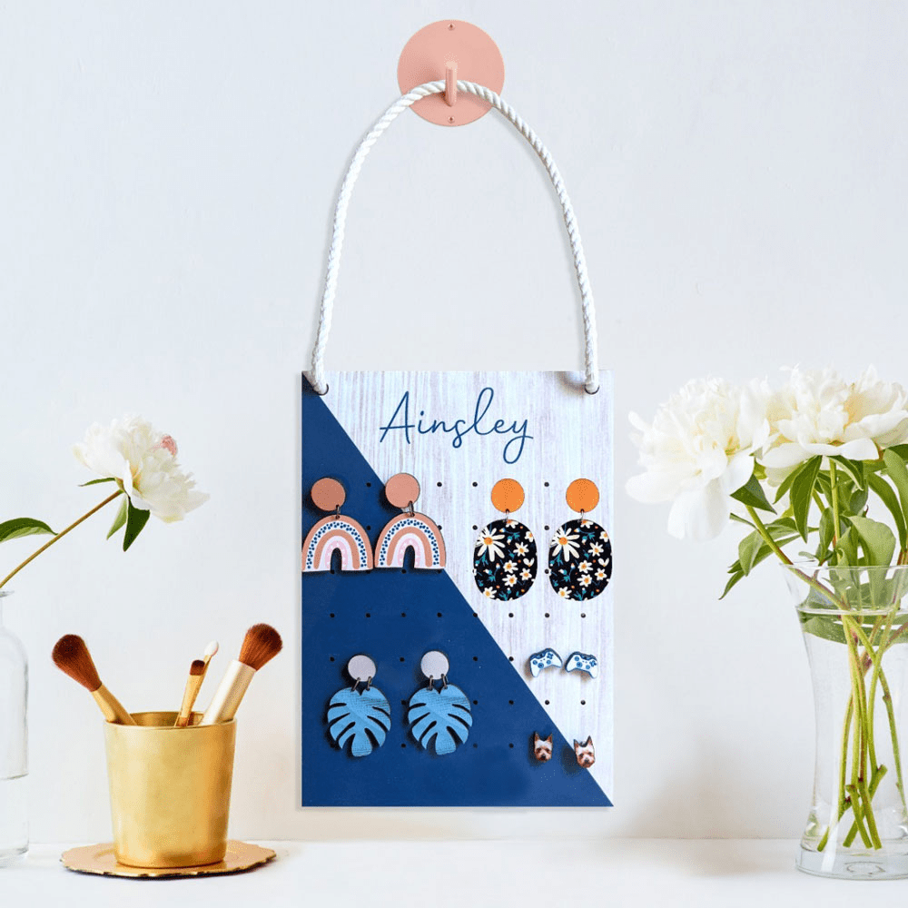 personalized earring hanger hanging on wall