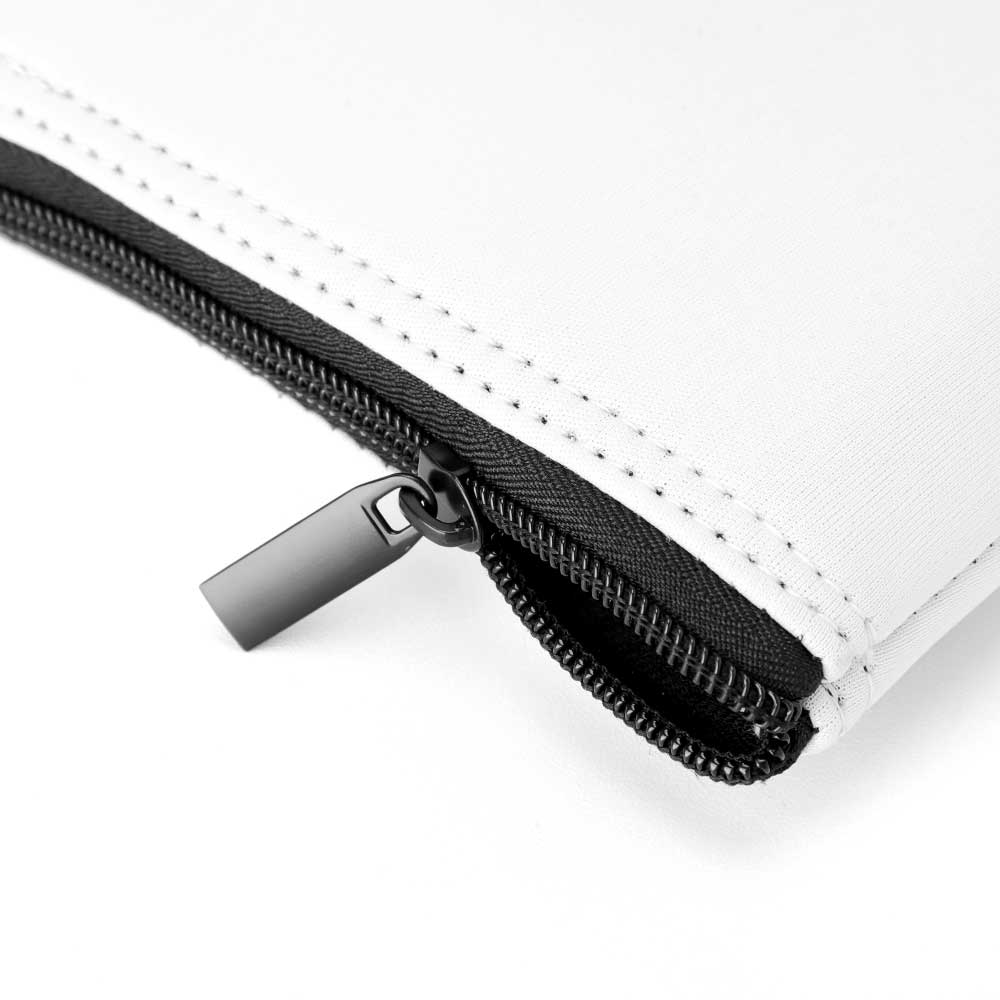 Close up of black zipper on white pouch