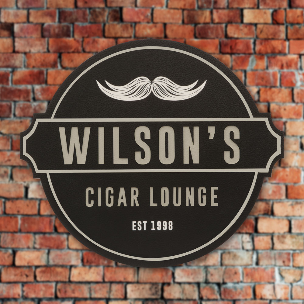 Wilson's cigar lounge sign hanging on wall