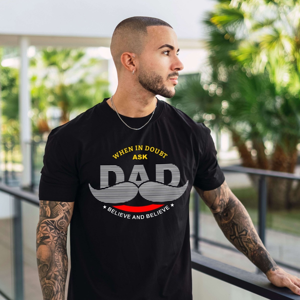 Man wearing black shirt with dad design