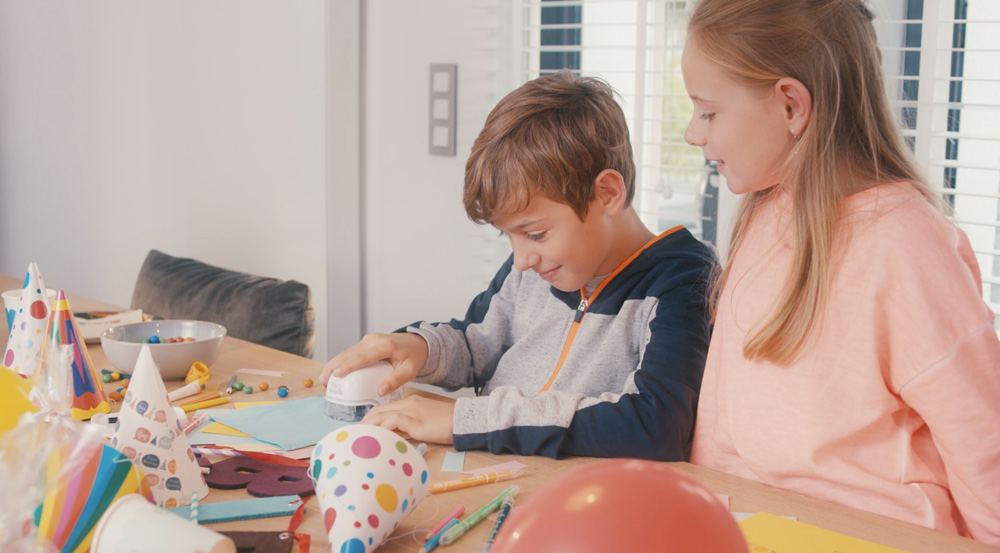 Making personalized items at home with the COLOP e-mark create handheld printer.