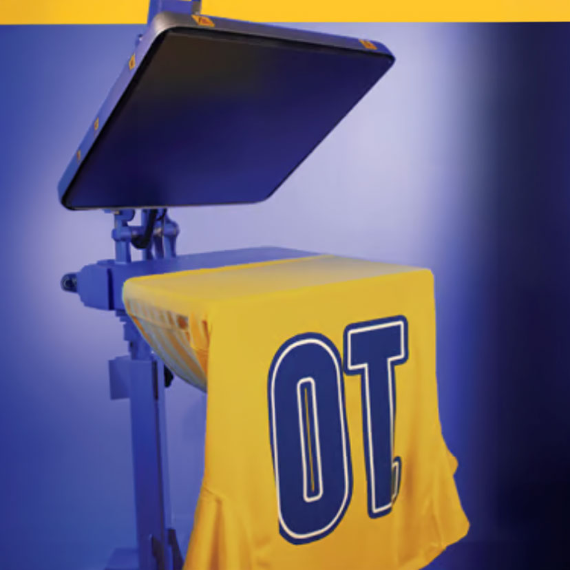 yellow shirt with purple number 10 on it sitting on the heat press. Purple and yellow background